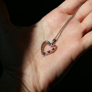 Zales  Garnets and White Sapphire Necklace